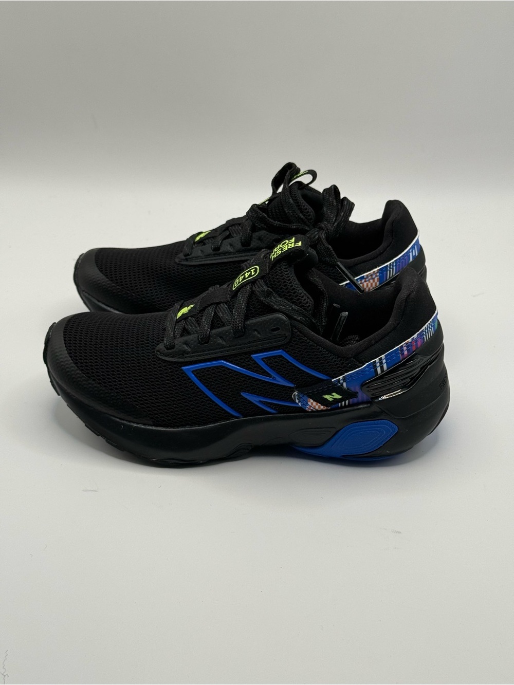 New Balance Black Sneakers with Blue & Neon Green Accents